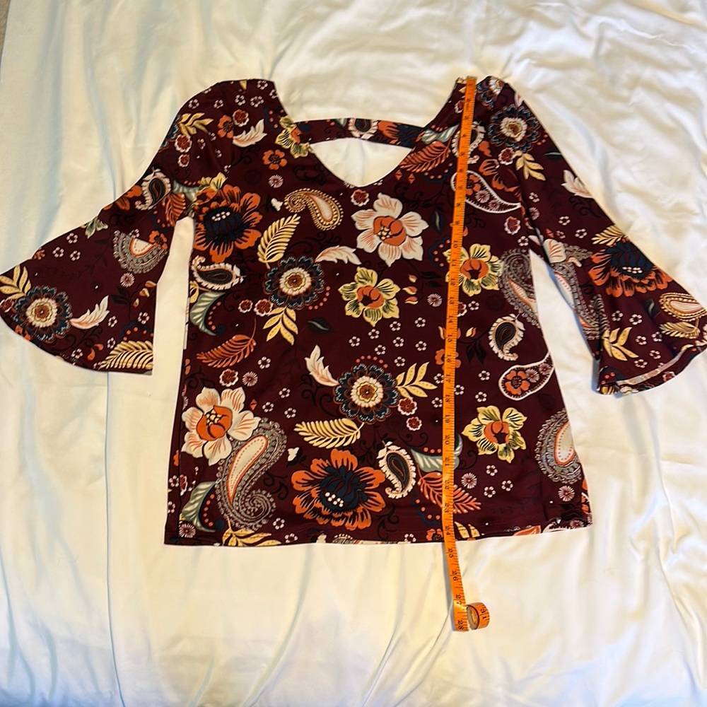 Women’s brown and floral blouse